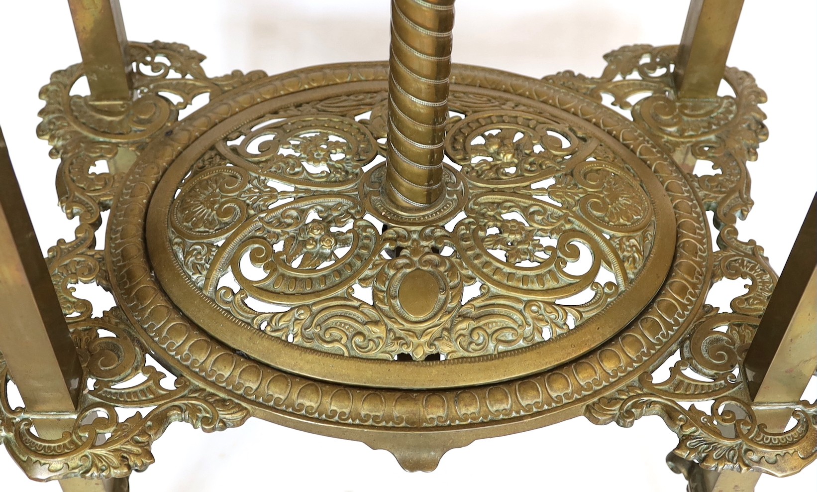 A late 19th century English pierced brass green onyx and glass lamp standard etagere, height overall 154cm, width 48cm